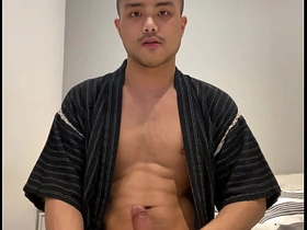 Asian boy in Jinbei stroking asian gay soccer porn